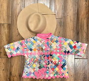 Abrigo de bebé reversible con pajarita
