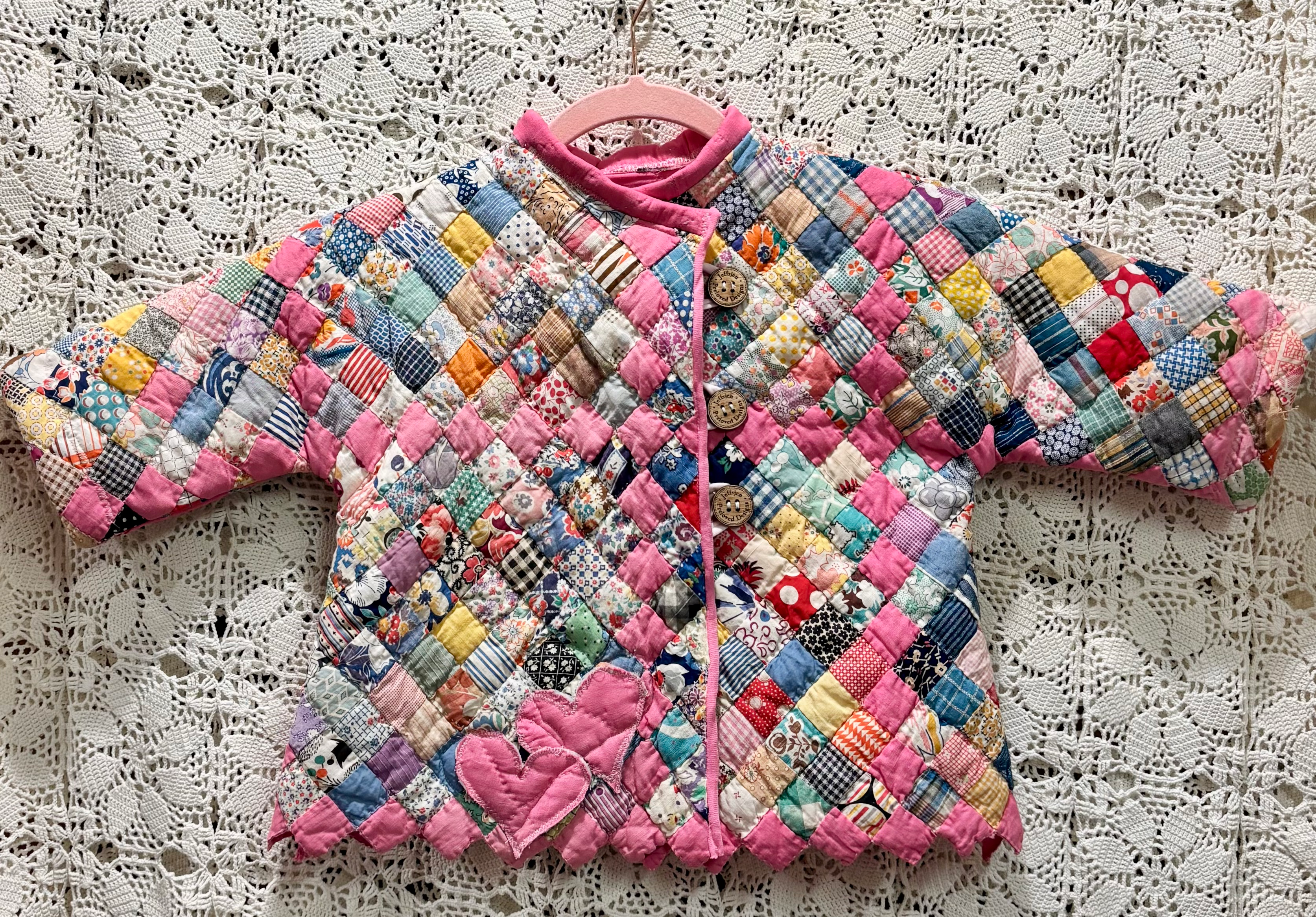 Abrigo de bebé reversible con pajarita