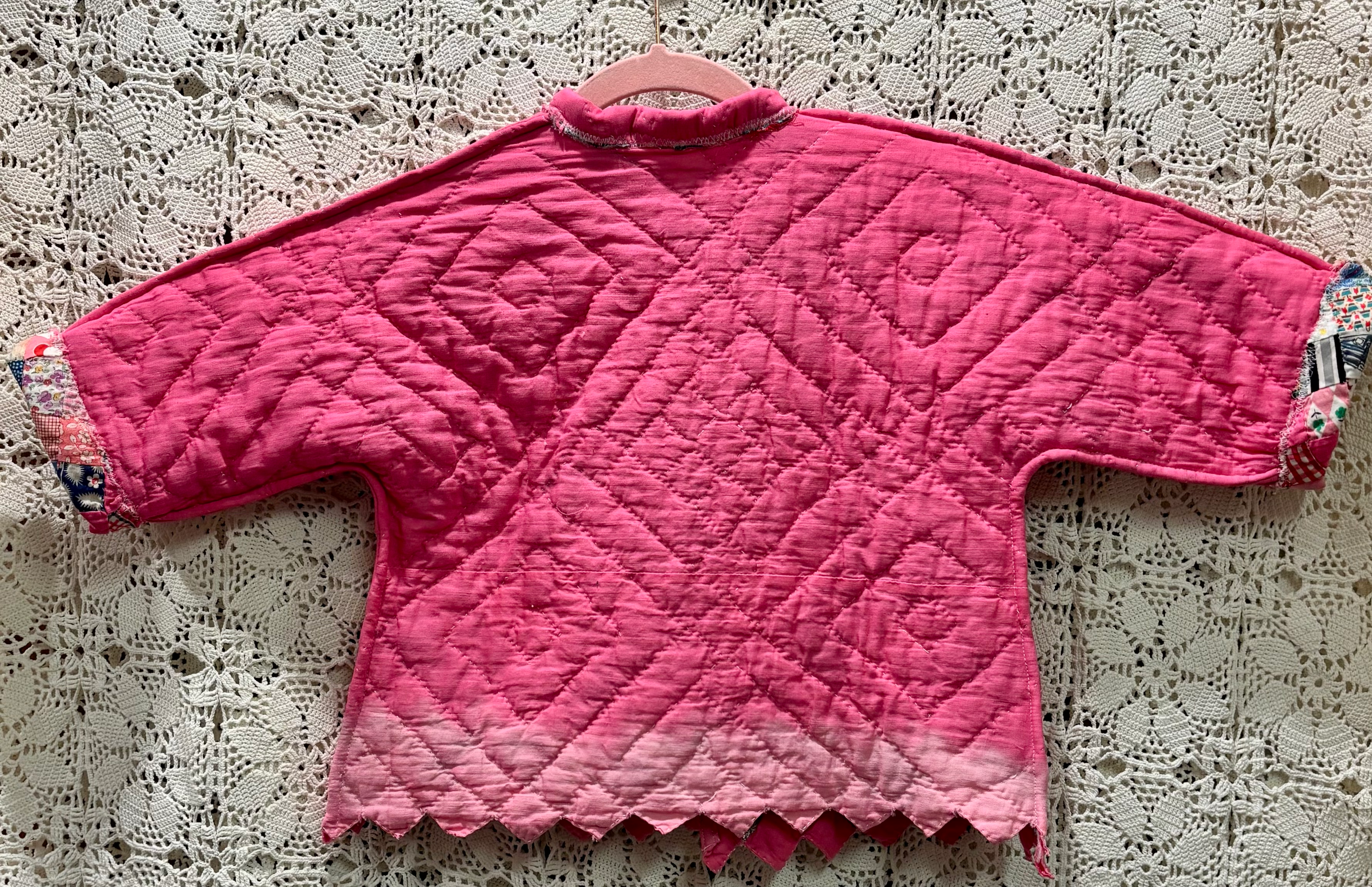 Abrigo de bebé reversible con pajarita